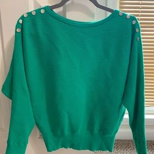 Green sweater with silver buttons